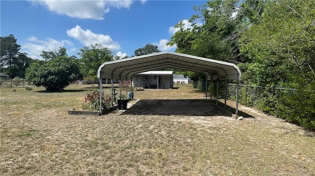 3412 Seven Mountain Dr, Fayetteville, NC 28306 - view of parking / parking lot featuring a detached carport