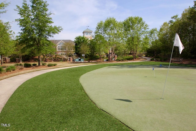 view of property's community featuring a putting green