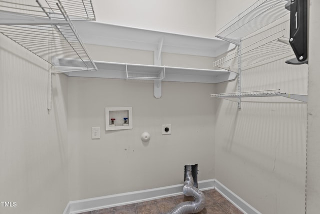 309 Coachmans Trl, Stem, NC 27581 - clothes washing area featuring hookup for a washing machine, electric dryer hookup, baseboards, and tile patterned flooring