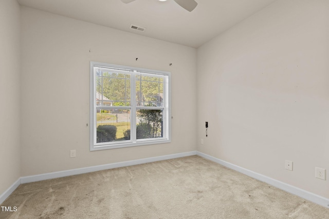 309 Coachmans Trl, Stem, NC 27581 - unfurnished room with carpet flooring, baseboards, and a ceiling fan