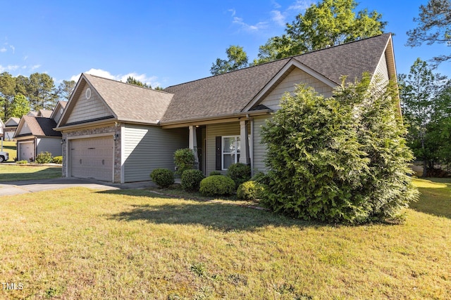 309 Coachmans Trl, Stem, NC 27581 - view of front of home with a garage, a front lawn, roof with shingles, and concrete driveway
