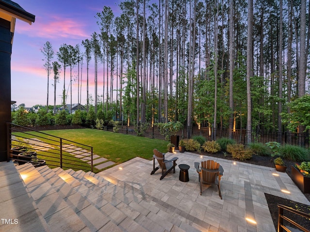 604 Dappled Pine Ave, Durham, NC 27713 - patio terrace at dusk with a patio