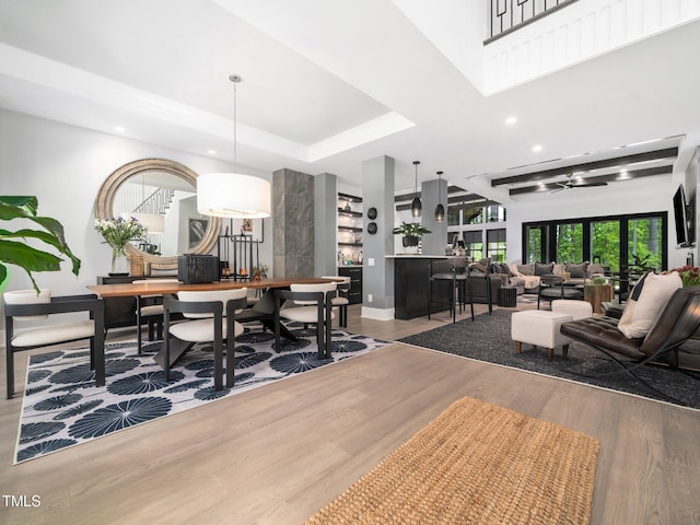 604 Dappled Pine Ave, Durham, NC 27713 - dining room with wood finished floors, recessed lighting, baseboards, ceiling fan, and a tray ceiling