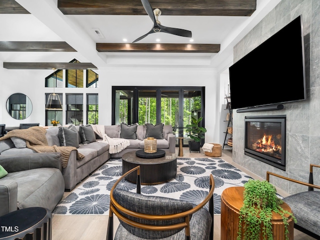604 Dappled Pine Ave, Durham, NC 27713 - living area with beam ceiling, coffered ceiling, a ceiling fan, a fireplace, and recessed lighting