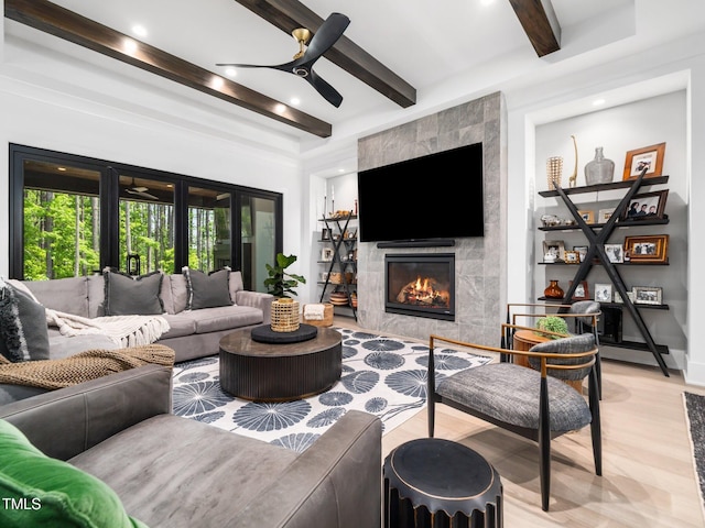 604 Dappled Pine Ave, Durham, NC 27713 - living area featuring beam ceiling, ceiling fan, a fireplace, wood finished floors, and recessed lighting