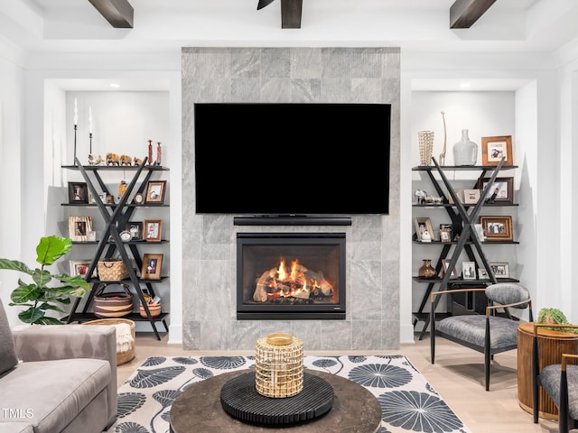 604 Dappled Pine Ave, Durham, NC 27713 - living room with a fireplace, wood finished floors, and a ceiling fan