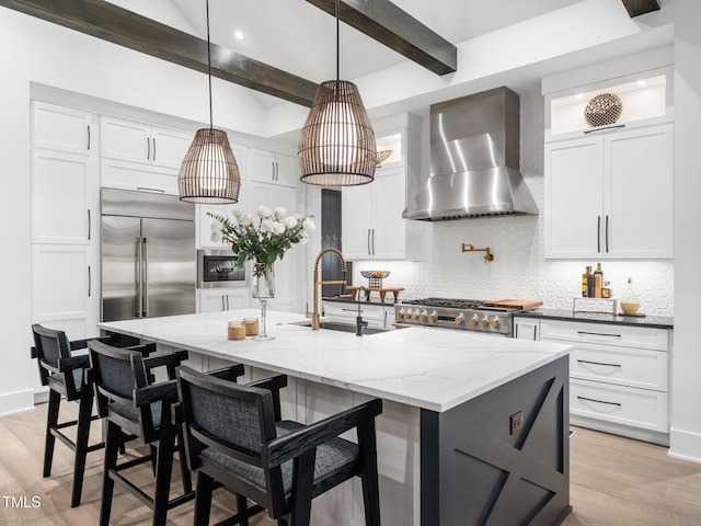 604 Dappled Pine Ave, Durham, NC 27713 - kitchen with wall chimney range hood, stainless steel built in fridge, beam ceiling, decorative backsplash, and white cabinets