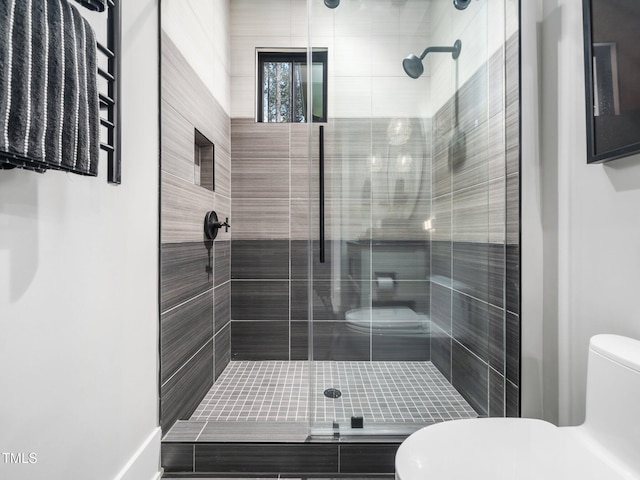 604 Dappled Pine Ave, Durham, NC 27713 - full bath featuring toilet, a stall shower, and a towel warming rack