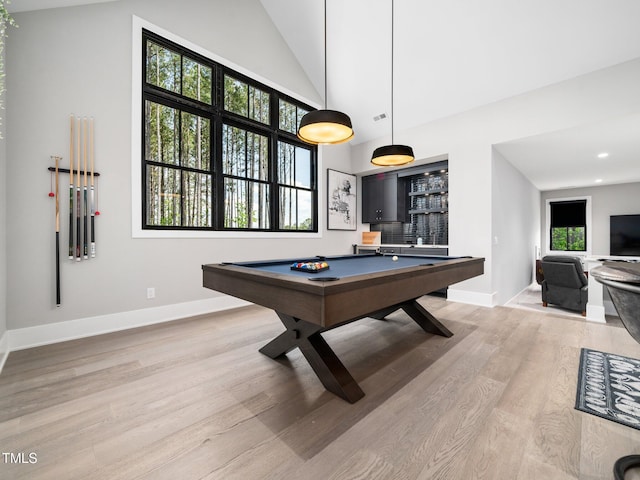 604 Dappled Pine Ave, Durham, NC 27713 - recreation room with billiards, baseboards, light wood-style flooring, and high vaulted ceiling
