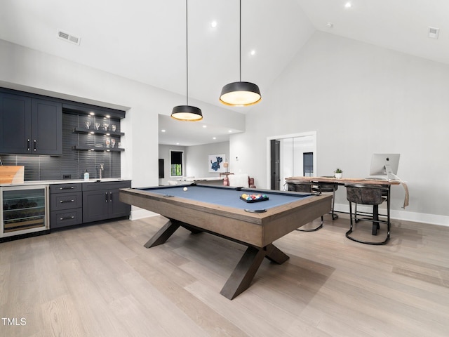 604 Dappled Pine Ave, Durham, NC 27713 - recreation room featuring beverage cooler, bar with sink, light wood-style floors, high vaulted ceiling, and billiards table