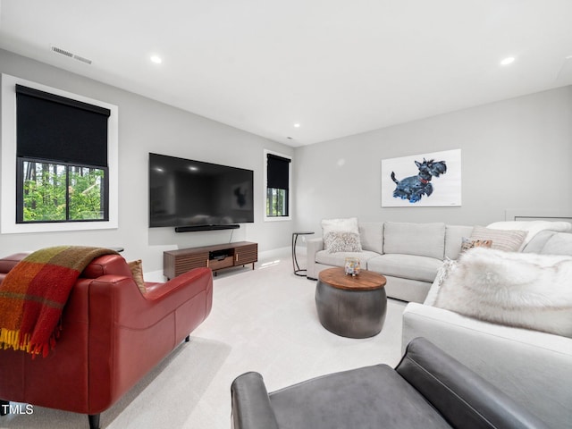 604 Dappled Pine Ave, Durham, NC 27713 - living room with carpet flooring, recessed lighting, and baseboards