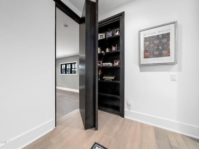 604 Dappled Pine Ave, Durham, NC 27713 - hallway featuring wood finished floors and baseboards