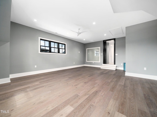 604 Dappled Pine Ave, Durham, NC 27713 - spare room featuring attic access, wood finished floors, recessed lighting, baseboards, and a ceiling fan