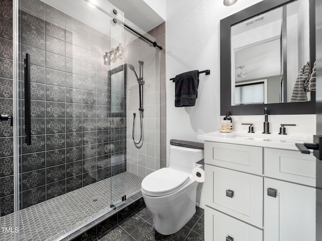 604 Dappled Pine Ave, Durham, NC 27713 - bathroom with toilet, vanity, a shower stall, and tile patterned flooring