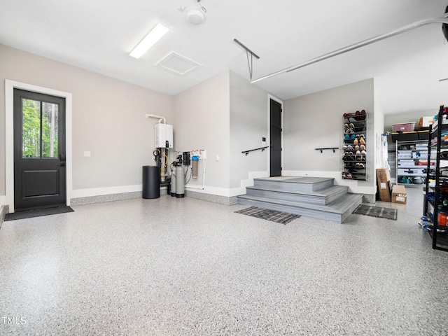 604 Dappled Pine Ave, Durham, NC 27713 - garage featuring baseboards
