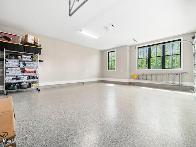 604 Dappled Pine Ave, Durham, NC 27713 - garage featuring baseboards