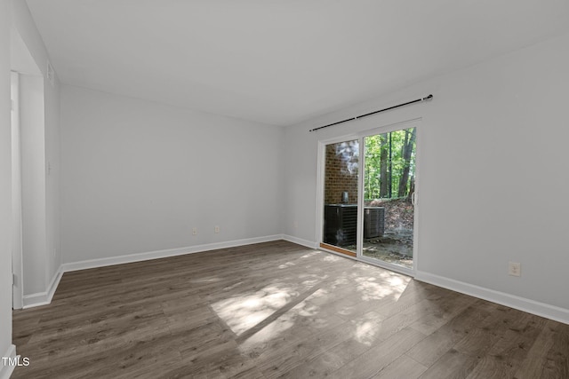 1131 Schaub Dr, Raleigh, NC 27606 - spare room featuring wood finished floors and baseboards