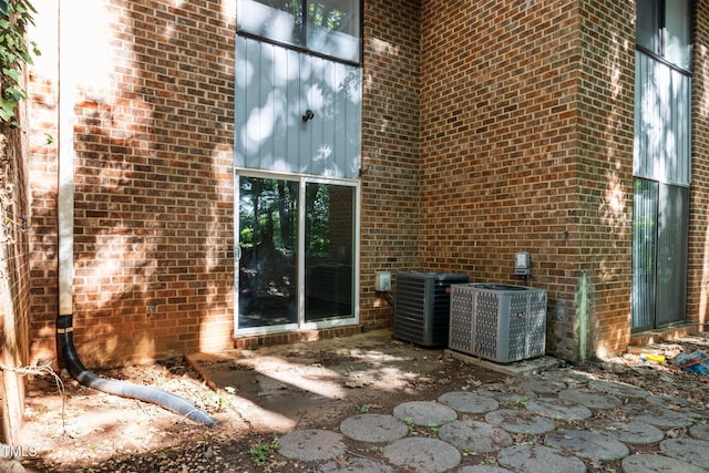 1131 Schaub Dr, Raleigh, NC 27606 - view of patio / terrace with central AC