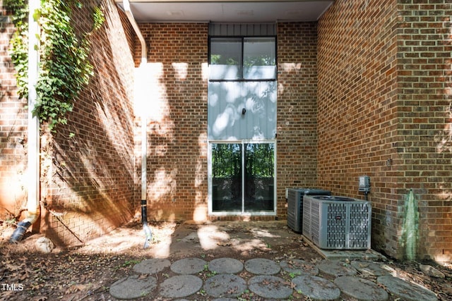 1131 Schaub Dr, Raleigh, NC 27606 - view of patio / terrace with central AC unit