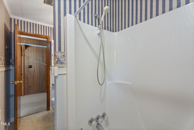 5517 Spring Rd, Raleigh, NC 27603 - bathroom view of wallpapered walls, ornamental molding, toilet, and shower / tub combination