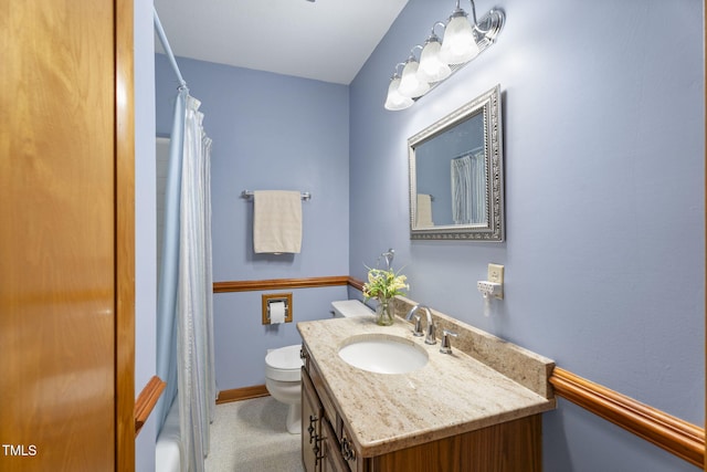 5517 Spring Rd, Raleigh, NC 27603 - bathroom with toilet, vanity, a shower with curtain, and baseboards