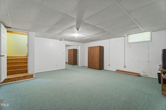 5517 Spring Rd, Raleigh, NC 27603 - below grade area with a drop ceiling, carpet, stairs, and baseboards