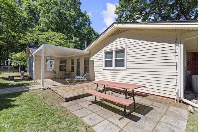 5517 Spring Rd, Raleigh, NC 27603 - rear view of property featuring a deck, central air condition unit, and outdoor dining space