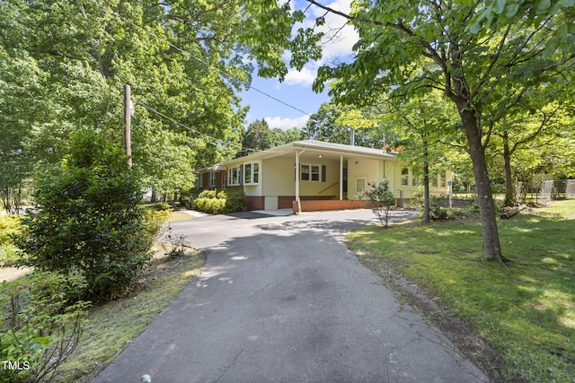 5517 Spring Rd, Raleigh, NC 27603 - single story home featuring driveway and a front yard