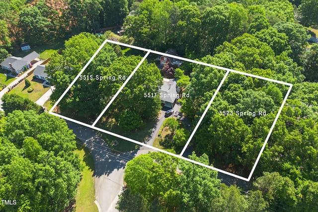 5517 Spring Rd, Raleigh, NC 27603 - aerial overview of property's location featuring property parcel outlined and a forest