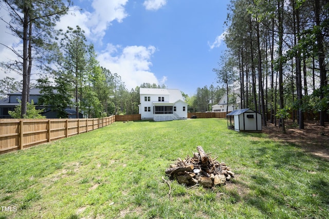 2200 Mays Crossroads Rd, Louisburg, NC 27549 - view of yard with an outdoor fire pit, a storage unit, and an outdoor structure