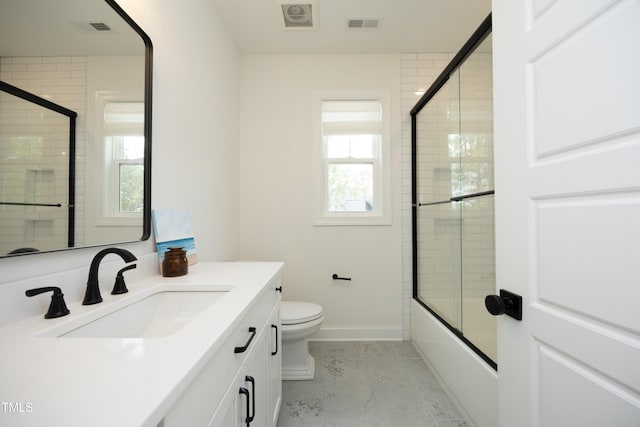 2200 Mays Crossroads Rd, Louisburg, NC 27549 - bathroom with vanity, baseboards, plenty of natural light, and toilet
