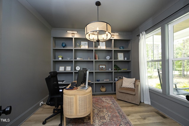 2200 Mays Crossroads Rd, Louisburg, NC 27549 - office space with wood finished floors, healthy amount of natural light, and a chandelier