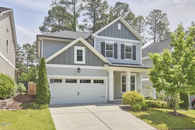 120 Chapel Run Way, Chapel Hill, NC 27517 - craftsman house featuring board and batten siding, a porch, driveway, and roof with shingles