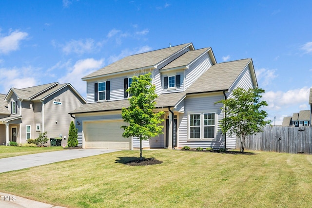 traditional home featuring driveway, an attached garage, and roof with shingles