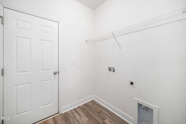 laundry area featuring hookup for an electric dryer, hookup for a washing machine, wood finished floors, and baseboards
