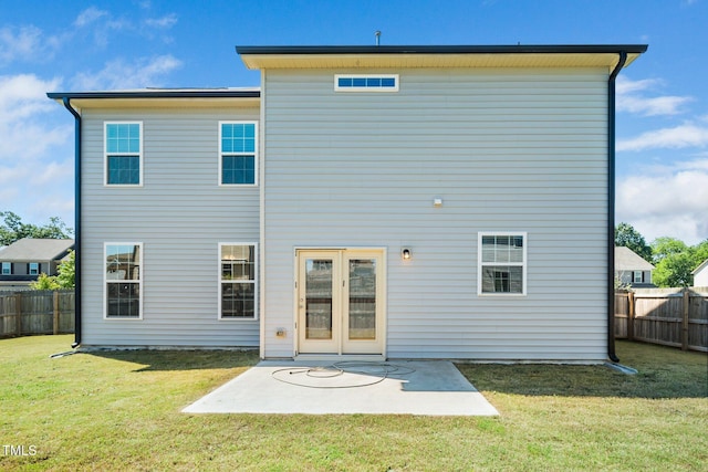 back of house with a patio