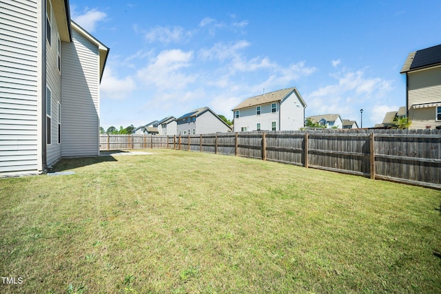 view of yard with a residential view