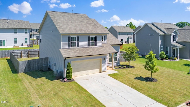 traditional home with a residential view, concrete driveway, a garage, central AC unit, and a shingled roof