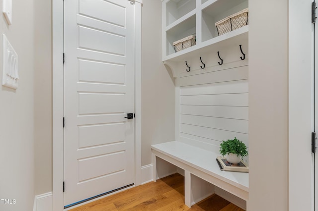 mudroom with light wood-style flooring