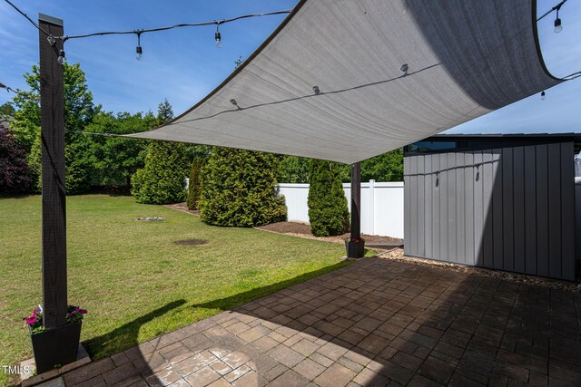 view of patio / terrace with an outdoor structure