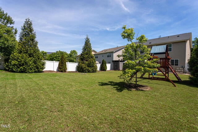 view of yard with a playground