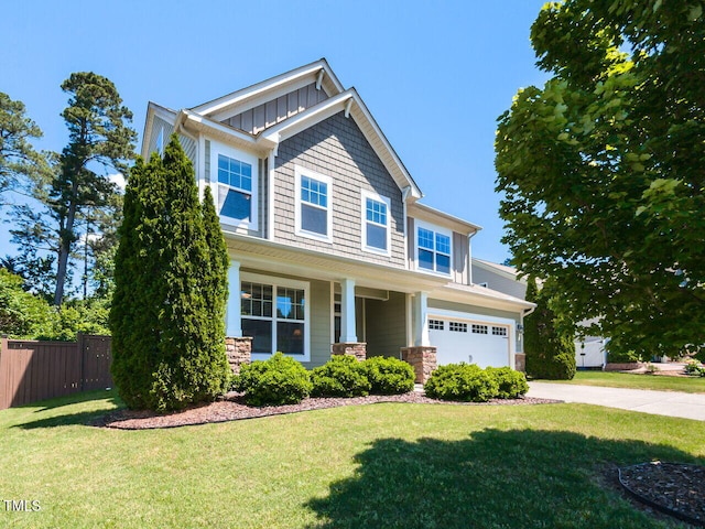 craftsman-style house featuring a garage, concrete driveway, stone siding, and board and batten siding