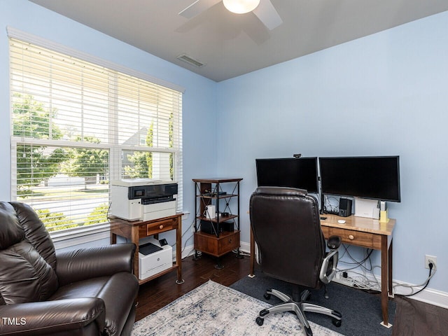 home office with wood finished floors, ceiling fan, plenty of natural light, and baseboards