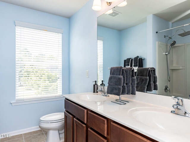 full bathroom with toilet, a shower, tile patterned floors, baseboards, and double vanity