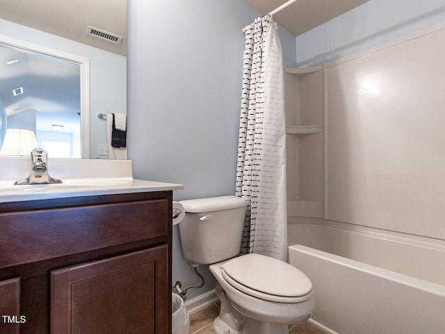 full bath with toilet, vanity, shower / bath combination with curtain, and tile patterned floors