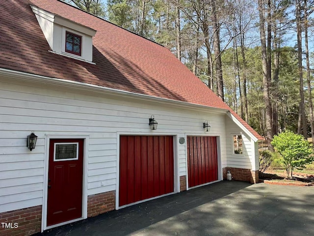 garage with driveway