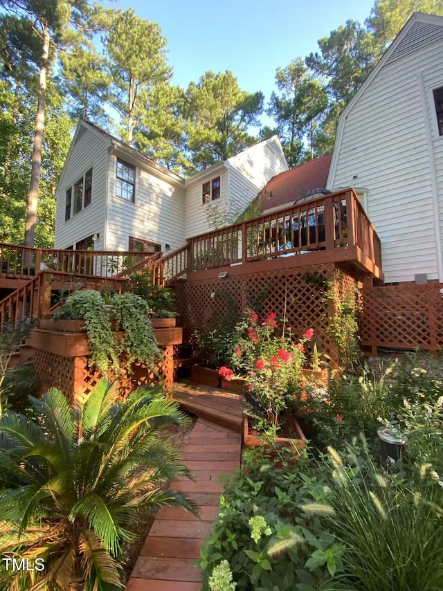 deck featuring stairway