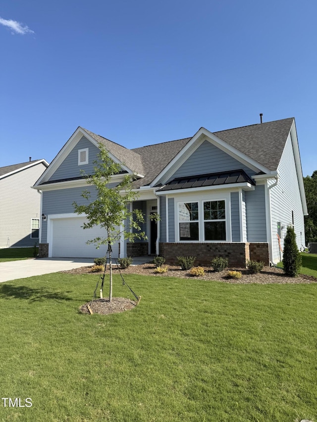 view of front of home with concrete driveway, a front yard, and roof with shingles