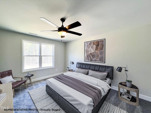 93 Butterbean Ct, Zebulon, NC 27597 - bedroom with carpet flooring, baseboards, and a ceiling fan