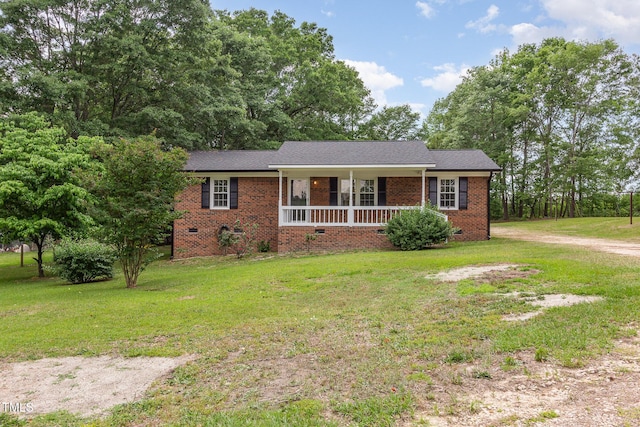 ranch-style home with a porch, a front yard, brick siding, and crawl space
